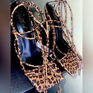 Mixx shuz Cheetah print heels strapped up strings